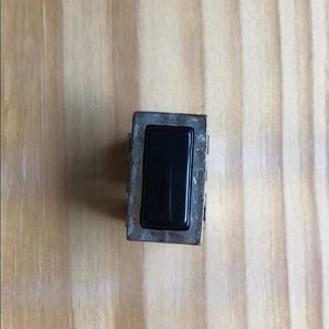 Adjustable silver and black ring